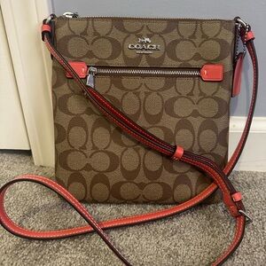 Coach signature mini Rowan file bag in signature/ tangerine color
